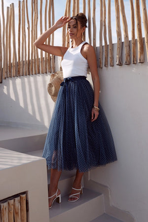 long blue polka dot skirt with bow